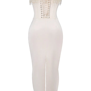 Elegant ivory bridal gown featuring intricate embroidery and a beaded corset with sheath silhouette, showcasing detailed patterns and design elements.