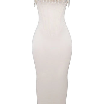 Luxury ivory embroidered bridal gown featuring a beaded corset, sheath silhouette, and elegant design details, displayed on a model showcasing the gown's intricate craftsmanship and flattering fit.