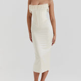 Luxury ivory embroidered bridal gown featuring an intricately beaded corset, showcasing a sheath dress design with elegant shoulder and neck detailing. The gown is modeled on a human figure, highlighting the sophisticated craftsmanship and graceful fit.