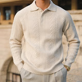 Luxurious men's beige knit polo sweater paired with vintage pleated grey trousers, featuring a collar and long sleeves.