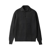 Luxury men's beige knit polo sweater paired with vintage pleated trousers, featuring a classic collar and button details, Nero color variant in size XL.