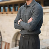 Luxurious men's beige knit polo sweater paired with vintage pleated trousers, showcasing a sophisticated style with attention to detail in the collar, sleeves, and overall fit.
