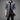 Luxury men's navy satin dress shirt in a tailored fit, featuring a button-down collar. The shirt is stylishly paired with charcoal grey suit trousers and a blazer, highlighting the sleek modern look. The model is wearing the shirt in a fashionable XXL size, showcasing a sophisticated and polished appearance.