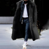 Luxury men's oversized designer winter fur coat in black, size 4XL, featuring a grey overcoat design with a sophisticated collar and long sleeves, modeled by a person wearing eyewear.