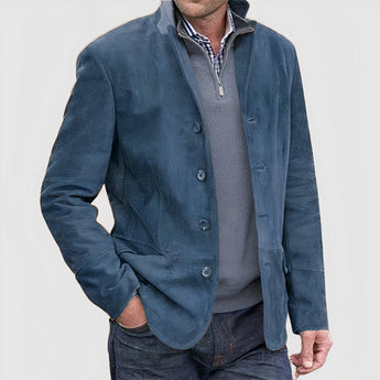 Luxury men's tan suede blazer, single-breasted design, displayed over a white dress shirt, highlighting the blazer's collar and sleeves, suitable for formal or smart-casual occasions.
