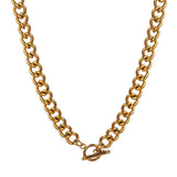 Luxury men's thick gold Cuban link bracelet, designer statement jewelry, showcasing a high-polish finish and sturdy clasp.