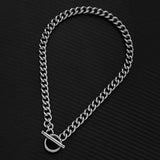 Luxury men's thick gold Cuban link bracelet with a designer statement style, displayed against a plain background.
