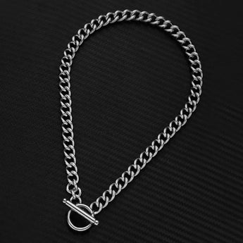 Luxury men's thick gold Cuban link bracelet with a designer statement style, displayed against a plain background.