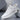 Luxury men's white leather sneakers with a crocodile texture design, variant color "Wit" in size 44. The sneakers feature an athletic style suitable for walking and casual sportswear.
