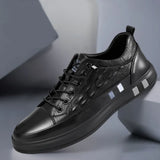 Luxury men's white leather sneakers with crocodile texture and black accents, featuring a sporty and fashionable design, suitable for outdoor and athletic activities.