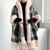 Dark gray luxury pastel wool rug with a plush high-pile texture, designed as an XL cozy carpet for added comfort and warmth.