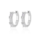 Luxury white gemstone silver-tone hoop earrings for women with gold accents.