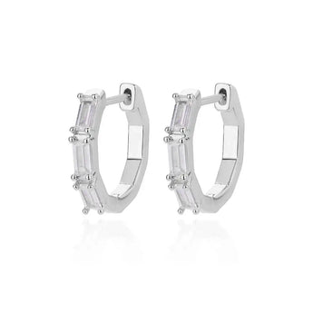 Luxury white gemstone silver-tone hoop earrings for women with gold accents.