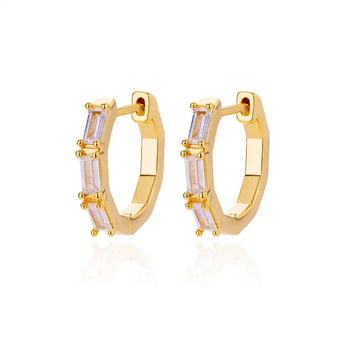 Luxury white gemstone gold hoop earrings for women, featuring elegant gemstones set in a polished gold finish.