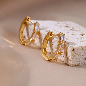 Luxury white gemstone gold hoop earrings for women with natural materials.
