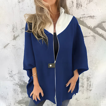 Elegant women's winter fashion coat, luxury white wool cape, featuring a sophisticated design with a high neck and wide sleeves, perfect for staying stylish in chilly weather.
