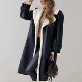 Luxurious women's black leather coat with shearling lining, featuring a stylish collar, long sleeves, and a knee-length design.
