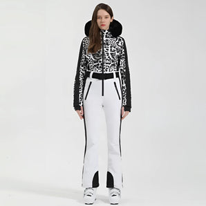 Luxury women's black and white designer snowboarding jacket, size XL, featuring a stylish collar, long sleeves, and tailored waist, perfect for fashionable winter sports.
