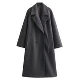 Luxury women's double-breasted wool winter coat in gray, featuring a formal and elegant design with a classic overlapping collar and long sleeves, tailored as an overcoat for a stylish and sophisticated look.