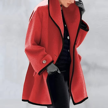 Luxury women's oversized purple wool coat featuring a fashionable design with contrast lining, showcasing a classic collar and long sleeves, emphasizing a stylish and modern look.