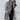Luxury women's purple wool coat with an oversized fit, featuring a contrasting lining, shown on a model highlighting the shoulder, neck, and sleeve details in a grey shade, resembling a sophisticated blazer.