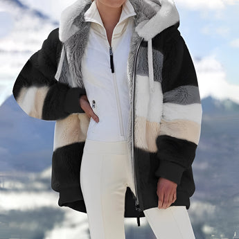 Luxury women's striped faux fur hooded winter jacket in Nero color, size 5XL, featuring long sleeves, a fashionable waistline, and a cozy collar.