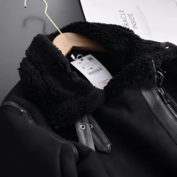 Luxury women's tan suede faux fur winter jacket with a plush faux fur collar, long sleeves, and a stylish waist design.