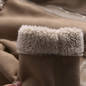Luxury women's tan suede faux fur winter jacket, featuring a plush faux fur collar and cuffs, showcased in a cozy and stylish winter setting.