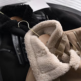 Luxury women's tan suede faux fur winter jacket featuring a comfortable fit, stylish sleeves, and a soft textile finish, photographed against a grey background.