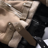 Luxury women's tan suede winter jacket with faux fur lining, featuring long sleeves and a plush collar, ideal for cold weather.