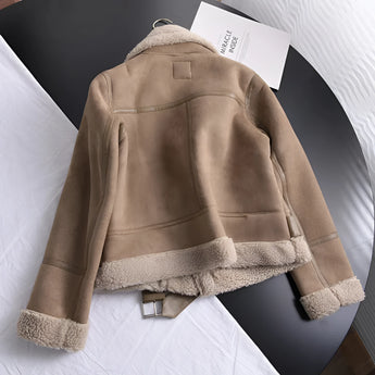Luxury women's tan suede faux fur winter jacket featuring long sleeves, a plush collar, and button details, showcasing a fashionable beige pattern.