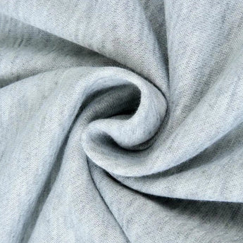 Grey textured fabric hoodie featuring long sleeves and a collar, designed for lightweight casual wear. Close-up shows the fabric's pattern and jersey material.
