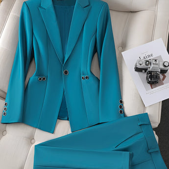 Women's teal textured blazer in blue, featuring a tailored design with long sleeves and a classic collar, suitable for office wear.