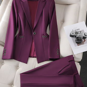 A teal textured blazer designed for women's office wear, featuring a sophisticated look with a tailored fit. The blazer has long sleeves, a classic collar, and is styled to complement formal and professional attire.
