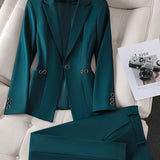 
Alt Text: Women's teal textured blazer with a subtle green hue, featuring a structured collar and long sleeves, designed for office wear in size 3XL.