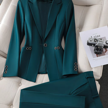 
Alt Text: Women's teal textured blazer with a subtle green hue, featuring a structured collar and long sleeves, designed for office wear in size 3XL.