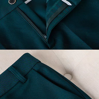 Women's teal textured blazer with a classic collar and long sleeves, designed for office wear.