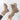 Brown Maria™ Women's Cozy Winter Ankle Boots with fur lining, shown on a human leg. The boots feature a slip-resistant sole and are designed for comfort and warmth during winter, blending fashion with functionality.