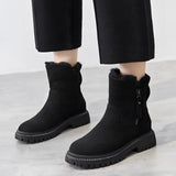 Black Maria™ women's cozy winter ankle boots with fur lining and slip-resistant soles, shown on a human leg, size 42.