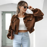 Maroon cropped women's suede jacket in XL size, featuring long sleeves and a trendy casual fashion style. The jacket is paired with sunglasses, adding a chic touch to the overall look.