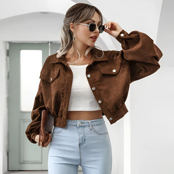 Maroon cropped women's suede jacket in XL size, featuring long sleeves and a trendy casual fashion style. The jacket is paired with sunglasses, adding a chic touch to the overall look.