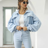 Maroon cropped women's suede jacket with long sleeves and a casual fashion style, suitable for trendy outfits.