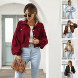 Maroon cropped women's suede jacket displayed on a mannequin, showcasing trendy casual fashion with visible shoulder and arm details.