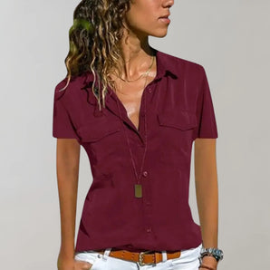 A maroon women's short sleeve button-down blouse designed for a casual summer look, featuring a classic collar and button-front closure, suitable for plus-size in 3XL.