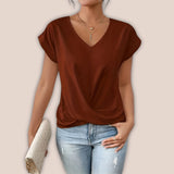 Mauve V-neck blouse featuring short sleeves and a relaxed fit, designed for casual chic summer fashion.