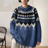 Men's blue argyle sweater in 2XL, featuring a neutral knit wool blend with a classic winter fashion design. The sweater has a white and electric blue pattern, showing shoulder, neck, sleeve, and waist details.