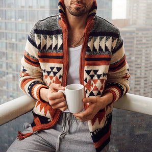 Men wearing a red Aztec pattern knit cardigan, size 4XL, with a coffee cup in hand and stylish eyewear, showcasing urban chic fashion.