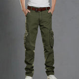 Men's green camouflage cargo pants with multiple pockets, featuring a military-inspired design.