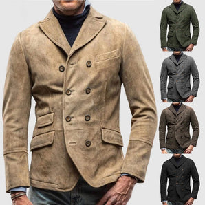 Men's beige double-breasted suede blazer in vintage military style, featuring a classic design with black and white accents. The blazer has long sleeves and is shown over a white dress shirt with a tartan pattern, emphasizing its elegant and timeless appeal.