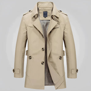 Men's beige double-breasted trench coat with epaulettes in khaki color, featuring a stylish collar, long sleeves, and button details in a formal fashion design.